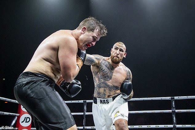 Nelson Asofa-Solomona (right) delivered the punch of the night when he dropped Jarrod Wallace (left) with a wild ball just seven seconds into their fight