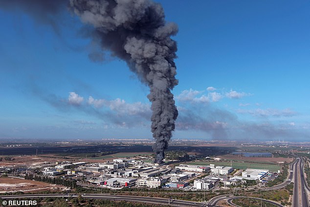 Smoke is seen in the Rehovot area as rockets are launched from the Gaza Strip