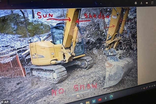 An FBI photo depicting the site of his 2018 digging for Civil War gold is seen on Dennis Parada's laptop