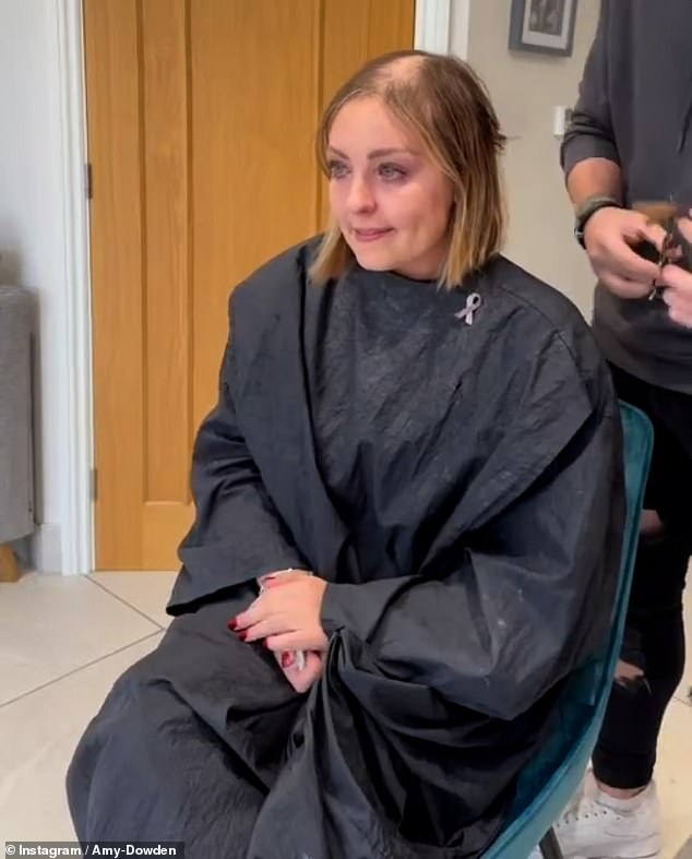Brave: Amy, who was diagnosed with breast cancer in May, recently decided to take control as she shaved off her hair during chemotherapy
