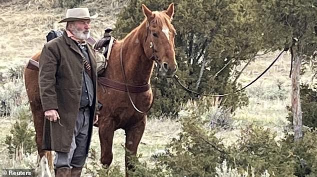 In trouble: The actor's exit comes just one day after he and other producers of the upcoming western film Rust were accused of obstructing the criminal investigation into the fatal shooting of Halina Hutchins, which took place on the set of the feature film;  he was seen on the set of the film in April