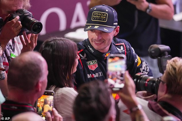 The Dutchman was at the center of celebrations in Qatar as the driver claimed a third title.