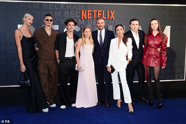 Nicola and Brooklyn looked as loved up as ever as they joined David and Victoria and siblings Romeo, 21, Cruz, 18, and Harper, 12, at the premiere on Tuesday.