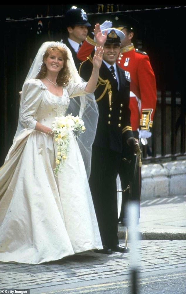 Prince Andrew, Duke of York, and Sarah Ferguson wave outside Buckingham Palace on their wedding day, London, England, July 23, 1986