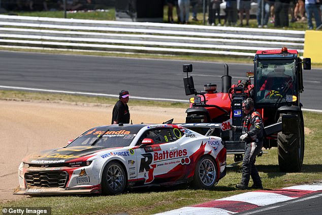 The car of Dale Wood and Andre Heimgartner (above) was withdrawn from the race after an accident caused smoke to erupt from the rear.