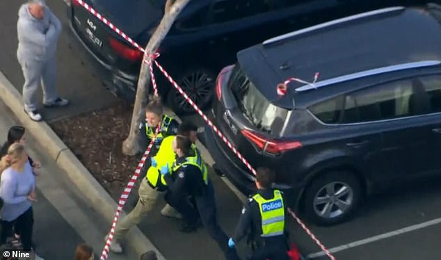 Police say the battle to control Melbourne's illegal tobacco trade is linked to the latest gangland executions.  The photo shows a scene from the aftermath of the shooting