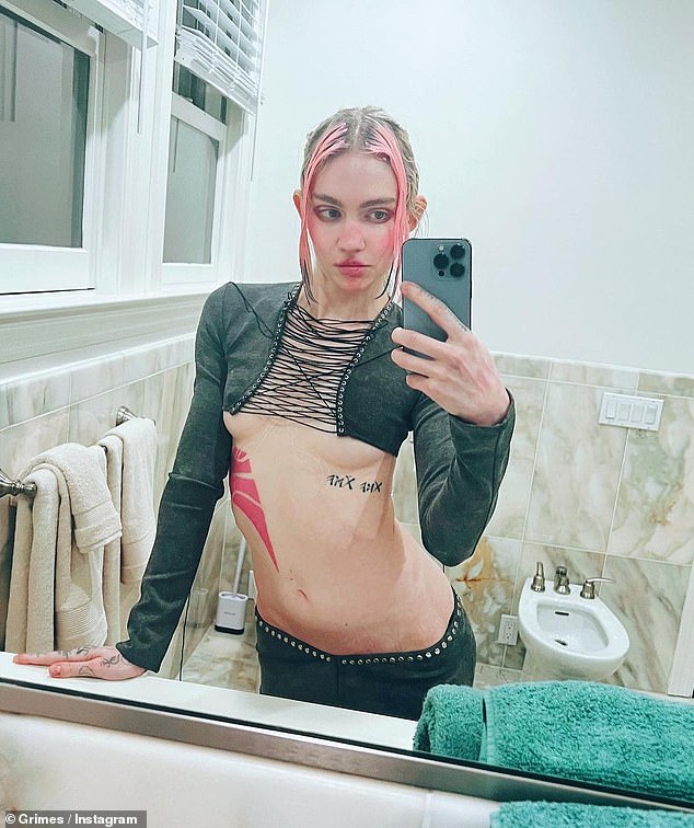 Grimes Instagram Promotes Her New Single 'I Wanna Be Software' And Shows Off New Tattoos In 2023