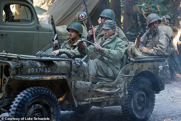 Schuetzle, of Pierre, South Dakota, is a film producer dealing in military costumes.  He was pictured on a film set in the driver's seat of the Jeep