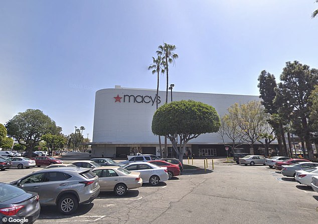 The robbery took place at a Macy's in Crenshaw, and the officers were parked just 200 yards away - before driving off and booking the game