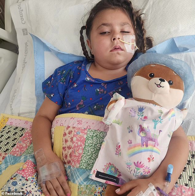 Doctors expect some side effects, including the potential loss of some peripheral vision and some fine motor skills on her left hand.  Pictured: Brianna five days after her procedure