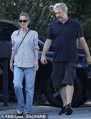 Relaxed: Dakota worked with Judd on the 2012 hit The Long Engagement, which he produced.  The Emmy winner wore knee-length black cargo shorts, a navy blue golf shirt and black sneakers