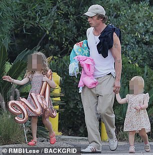 Prepared: The Shameless star looked prepared for almost any eventuality as he carried towels and swimming floats for Ezer, about five, and Dolores, about three, who he shares with estranged wife Addison Timlin.