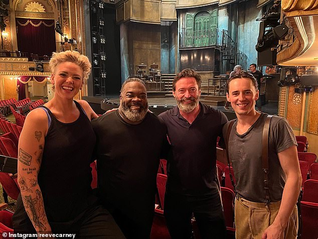 The pair caught up last week when Hugh visited Broadway to watch Betty perform in the musical Hadestown and even posed hand-in-hand with the singer backstage.  In another photo, Hugh is seen happily posing alongside Betty and co-stars Philip Boykin (second left) and Reeve Carney (right)