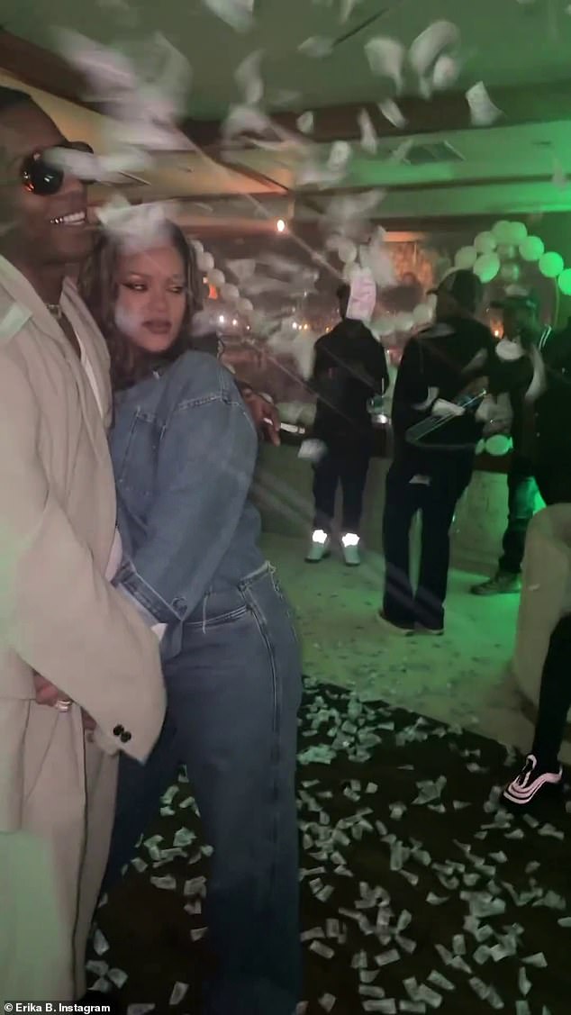 Big smile: His left arm was draped over her shoulders and they were seen pausing for photos together as more confetti was thrown in their direction