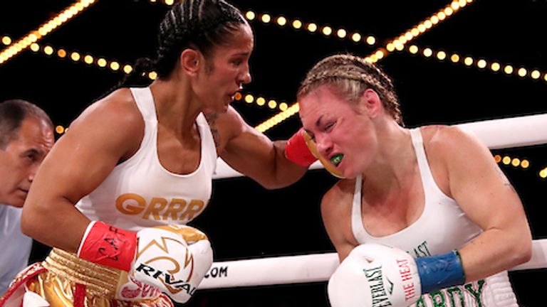 September 13, 2019;  New York, NY, USA;  WBO featherweight champion Heather Hardy and Amanda Serrano during their fight at the Hulu Theater at Madison Square Garden.  Mandatory Credit: Ed Mulholland/Matchroom Boxing USA