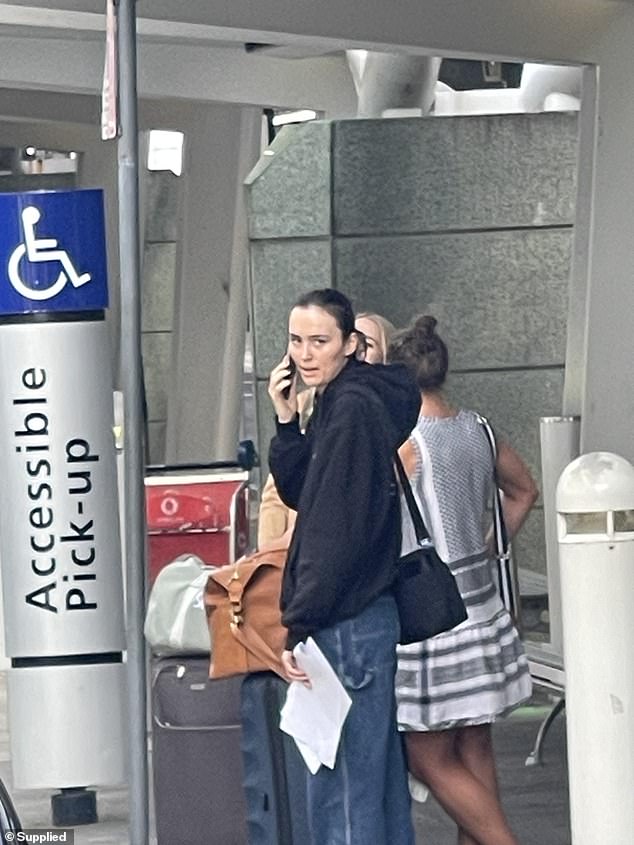 The pair were spotted walking through Sydney Airport with a small suitcase after flying in from Brisbane.