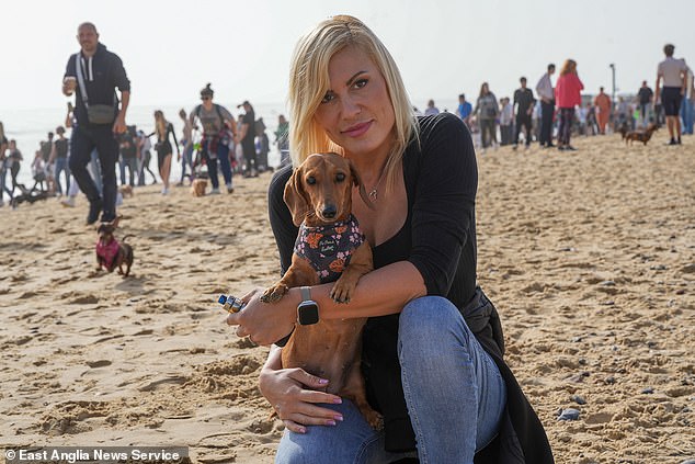 The beautiful Barbara Wolanska and her dachshund Tilly on the sausage dog walk