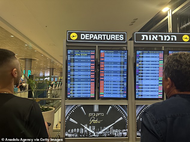 Departure boards at the international gate indicated that dozens of flights out of Israel had been cancelled