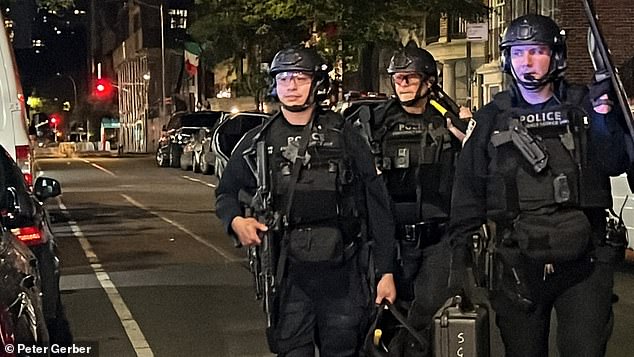 Heavily armed police were deployed to the home on New York's East 67th Street at 9 p.m.