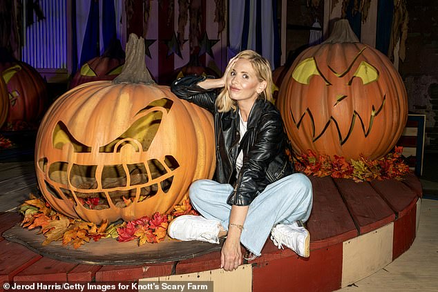 Jack-o-Lanterns: The Daytime Emmy winner for Hot Date wore a black leather jacket with light blue wide leg jeans and a white T-shirt and trainers