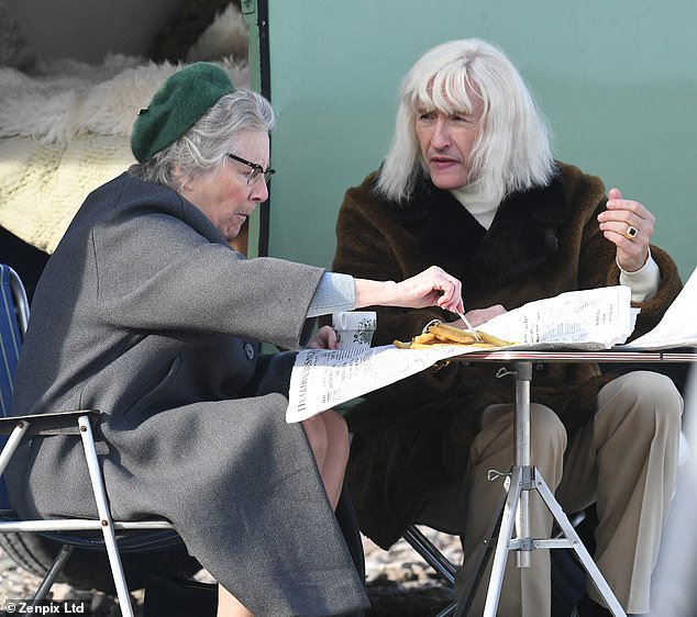 Food for thought: Steve Coogan stars as Jimmy Saville in a scene set in 1970. In BBC drama The Reckoning, he is shown eating fish and chips with his mother Agnes on the beach next to a camper