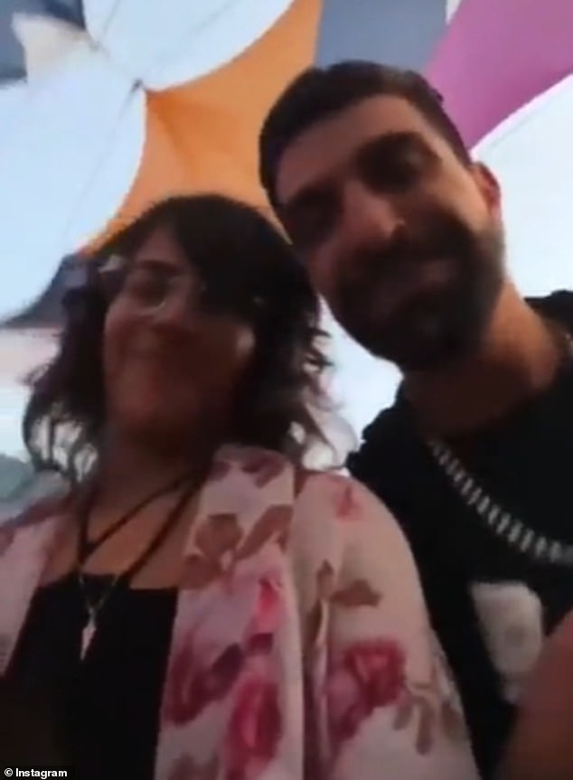 The woman even posed for a selfie with another concertgoer