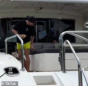 The yacht owner was seen looking at her before taking off and telling her to 'be careful'