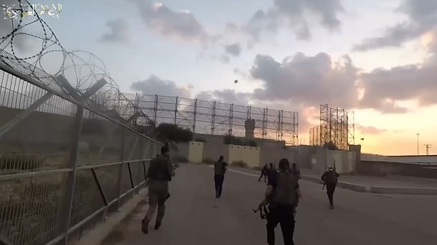 Hamas gunmen storm the compound across the border