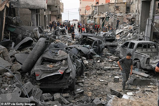 It is no exaggeration to argue that the primitive savagery displayed by Hamas at the weekend has caused a geopolitical earthquake.  In the photo, Palestinians inspect the destruction in a neighborhood badly damaged by Israeli airstrikes