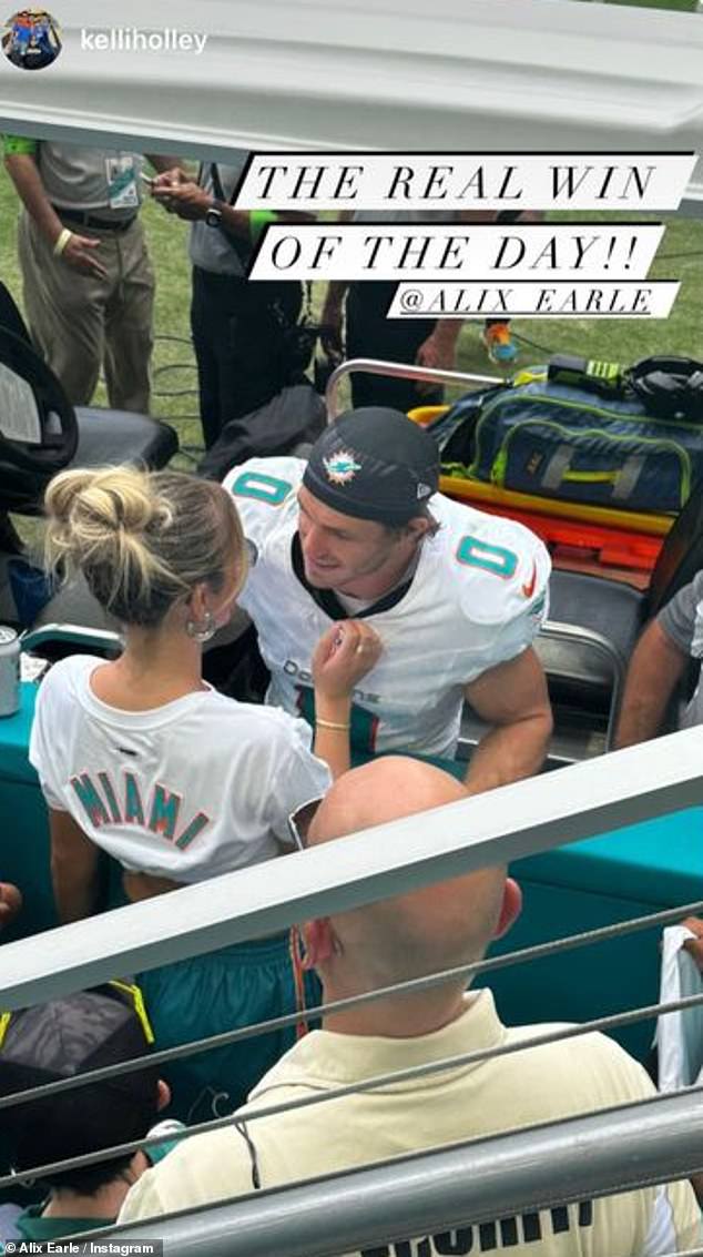 Victory: Another captured her giving Braxton a lean-in victory kiss at the end of the Miami Dolphins v New York Giants game with the caption: 'Real win of the day!!!'  and labeling Alix