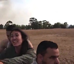 A young woman is seen being kidnapped on a motorbike