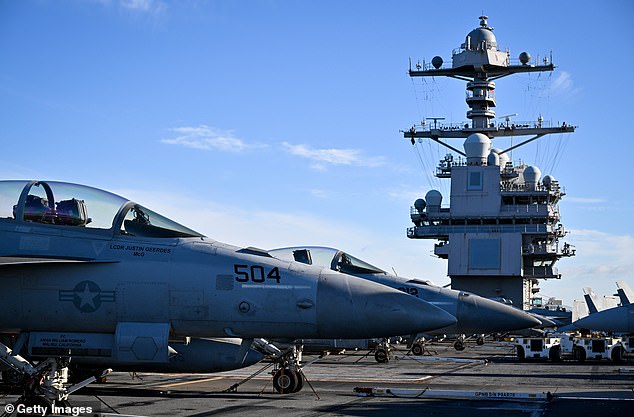 F-18 jet fighters are seen on the flight deck of the USS Gerald R. Ford on November 17, 2022 in Gosport, England