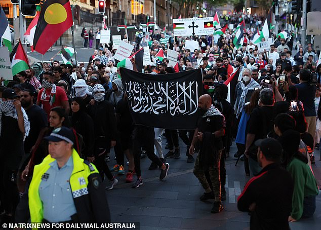 Protesters marched from Town Hall to the Sydney Opera House, chanting 