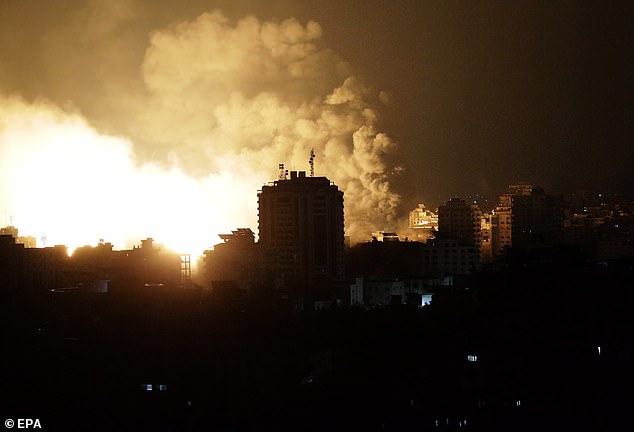 Smoke rises after an Israeli airstrike in Gaza City on Monday