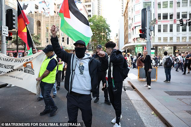 A counter-demonstrator was arrested for trying to hold up the Israeli flag as the pro-Palestinian protest began