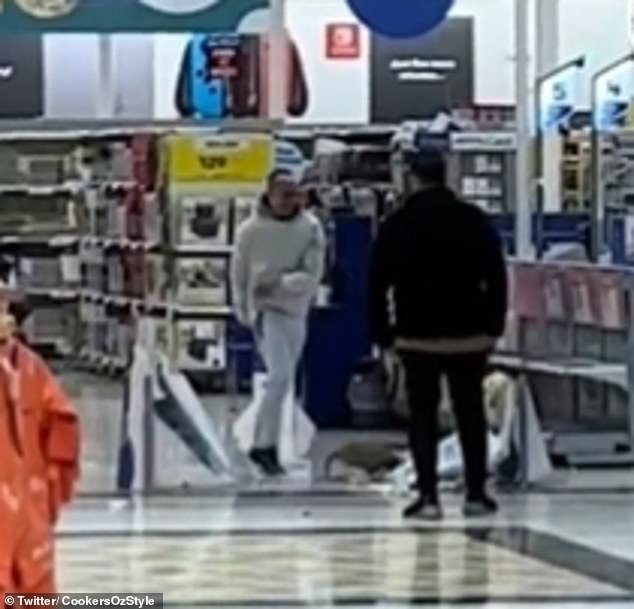 The man tore through both security scanners before calmly walking away inside the store