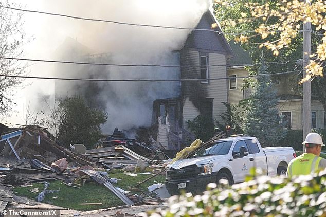 The nearby house was reduced to a smoking ruin after the explosion at 2.35pm