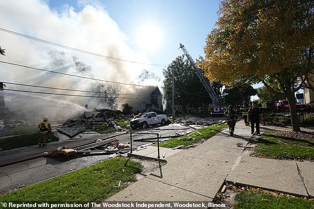 Debris was thrown across the road and into nearby gardens by the force of the blast