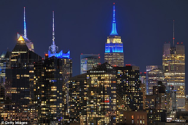 A number of other buildings on the New York skyline are bathed in blue light