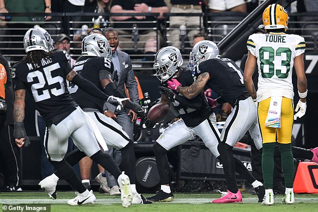 Robertson's final interception sealed Raiders' first win over Green Bay since 1987