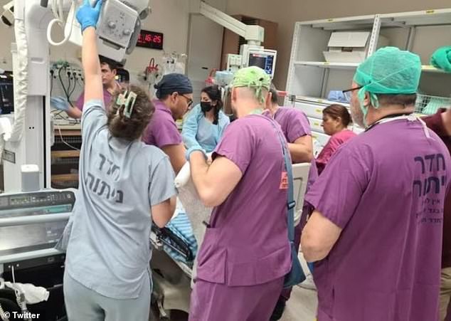 The medical team has been treating victims (pictured) non-stop since Saturday's horrific attack.  Codish said they treated injuries to civilians, children, the elderly in unprecedented numbers