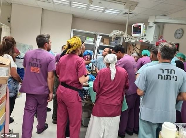 Soroka's medical team (pictured) serves as 'Israel's Iron Dome for Health.  The doctor said they treated a police officer who was shot in both legs and struggled to get to safety where an ambulance could pick up the officer