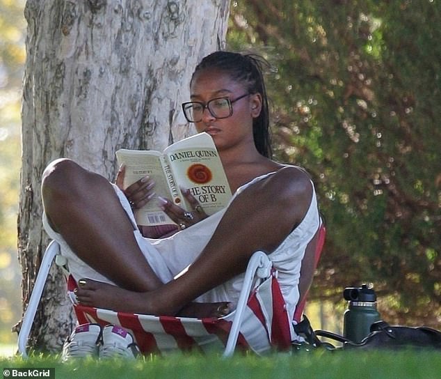 The 22-year-old kept it natural with minimal make-up, pulling her long, braided brown locks back into a ponytail