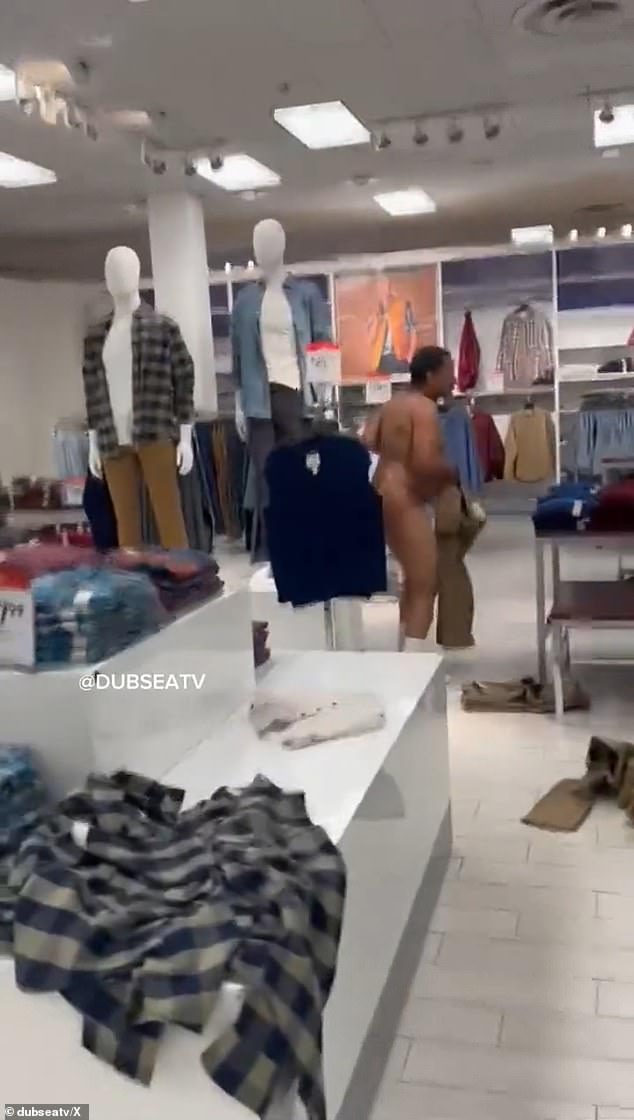 He is then seen grabbing a pair of pants from the store a few seconds later and trying to put them on