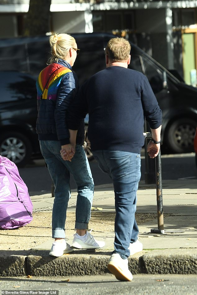 Sweet moments: The couple held hands as they enjoyed their time together