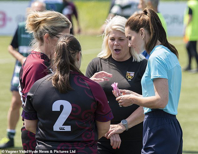 They were made in memory of Mrs Renton's daughter Issy, who tragically took her own life aged 17 earlier this year.  Kate vowed to wear the jewelery after picking it up in June during a trip to her mum's rugby club (pictured)