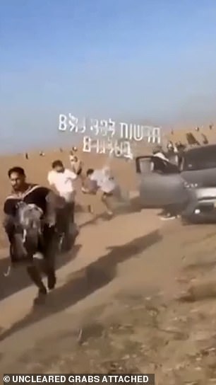 Footage shows terrified young Israelis fleeing from Hamas militants as they launched a deadly attack on those attending the desert Nova music festival