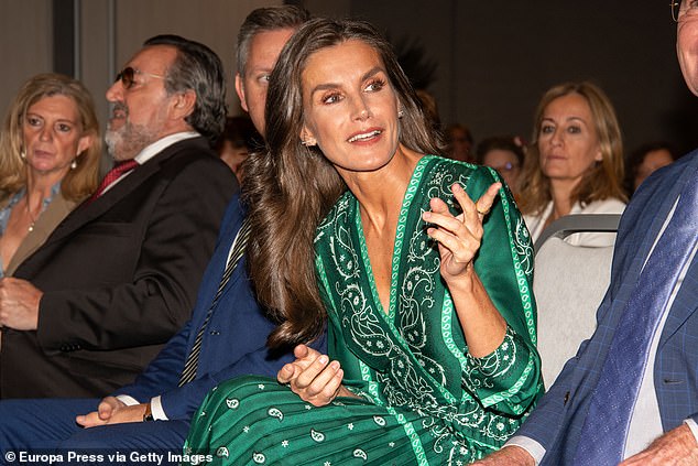 Often the minimalist, Letizia accessorized her look with just one gold ring and a pair of diamond encrusted earrings