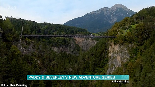 Dizzy-inducing: Suspended in the air, the comedian and soap star exclaims in shock at his daring feat, shouting: 'Oh my god!'  on several occasions