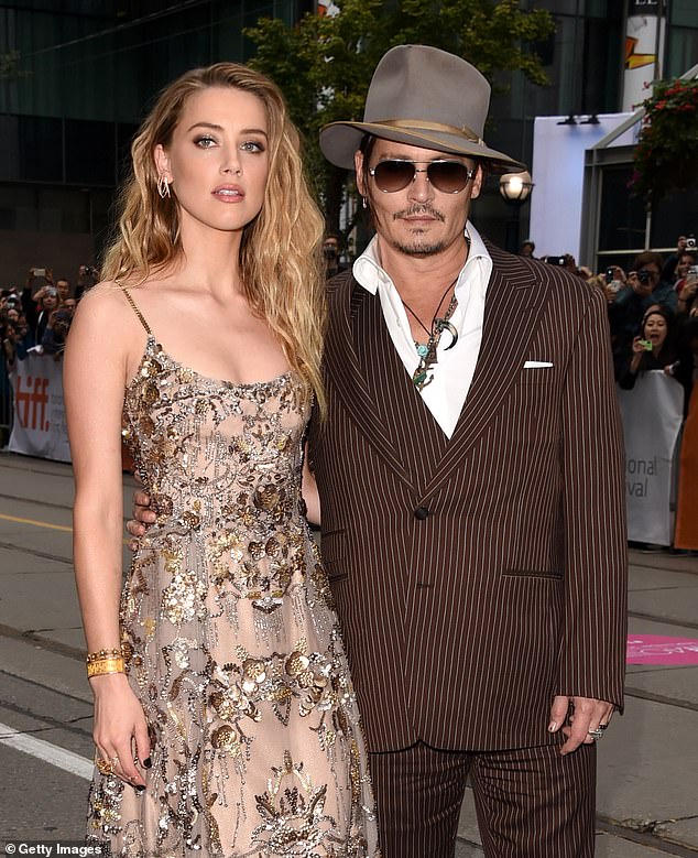 Bombshell: Unearthed therapy notes from Amber's sessions detail an alleged hostile Aquaman 2 set - read: 'Jason said he wanted me fired.  Jason drunk - late on set.  Dress up like Johnny.  Got all the rings too' (pictured with Depp in 2015)